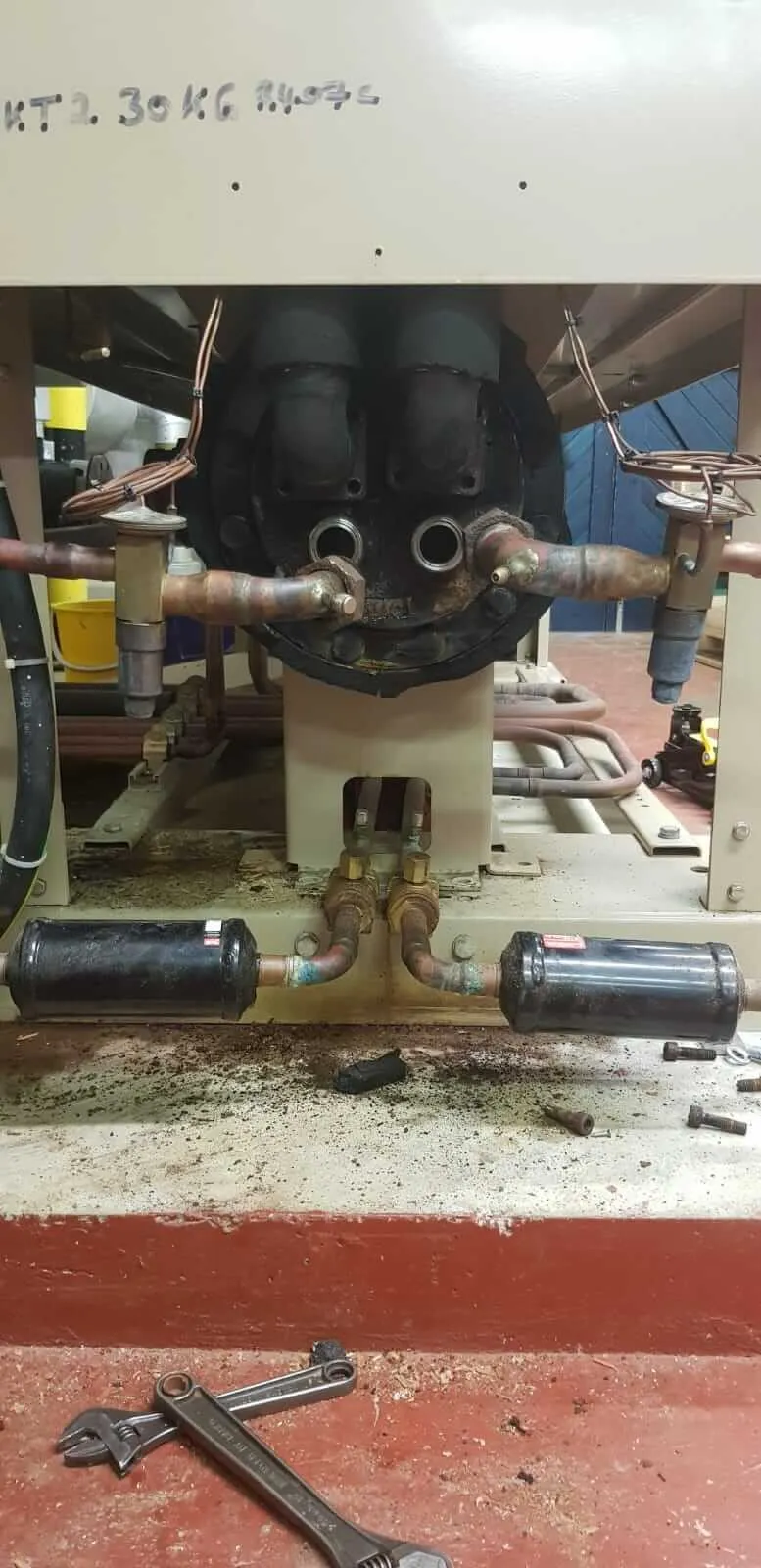 A machine that is working on a piece of machinery.